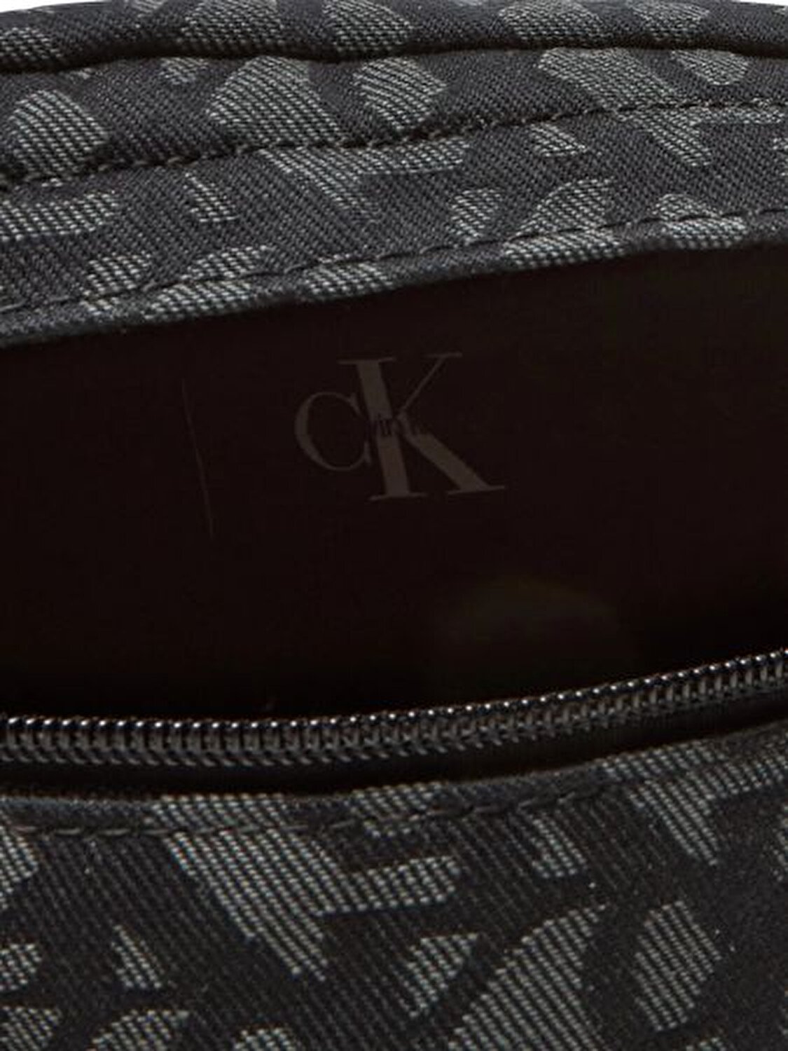 UNSTRUCTURED MONOGRAM WAISTBAG